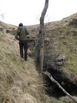 SX13065 Wouko walking on the edge of river Haffes waterfalls.jpg